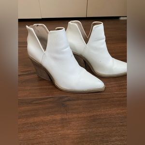 White ankle booties.